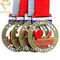 Antike Metalltrophäen-Meisterschafts-Medaillen mit Band
